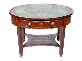 A George III Mahogany Drum Table
Height 28 3/4 x diameter 43 3/4 inches.