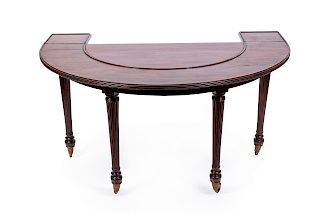 A Regency Mahogany Hunt Table
Height 28 3/4 x width 58 x depth 29 1/2 inches.