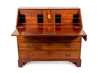 A Chippendale Mahogany Slant-Front Desk
Height 43 x width 46 x depth 22 1/2 inches.