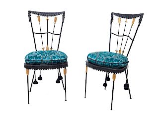 A Pair of Modern Wrought Iron and Partial Gilt Arrow-Form Chairs
Height 35 inches.