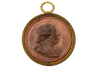 A Terracotta Portrait Medallion by Jean-Baptiste Nini
Diameter 7 inches.