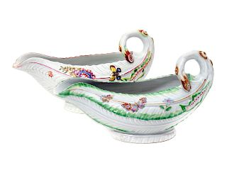 Two Worcester Porcelain Leaf-Molded Sauceboats
Height 4 x length 7 1/4 inches.