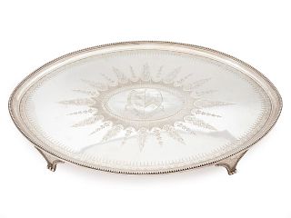 A George III Silver Salver
Length 21 1/4 x depth 15 1/2 inches.