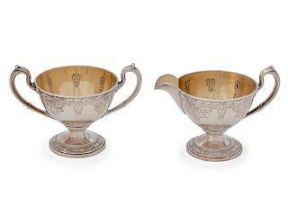 An American Silver Cream and Sugar
Height 3 7/8 inches.