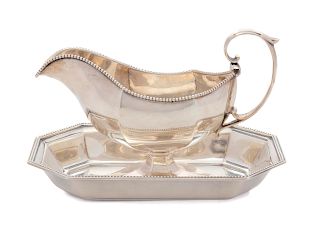 An American Gravy Boat and Undertray
Length of tray 5 1/2 inches.