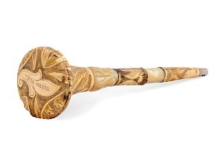 A French 14 Karat Gold and Agate Mounted Parasol Handle
Length 8 3/4 inches.