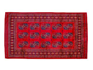 A Bokhara Wool Rug
8 feet 8 inches x 6 feet 2 inches.