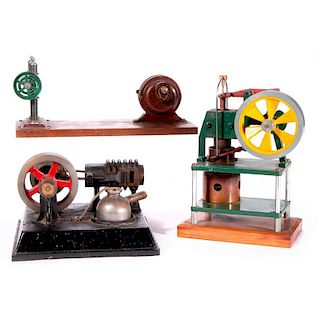 Three model factory machines.