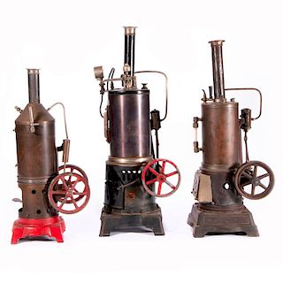 Three toy steam engines.