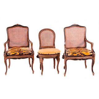 Seven dining chairs.