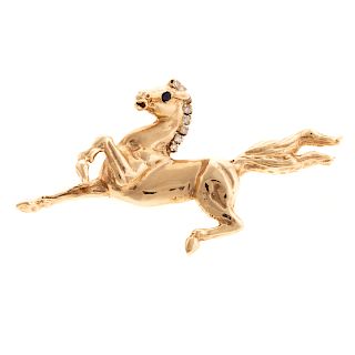 A Prancing Pony Brooch with Diamonds in Gold