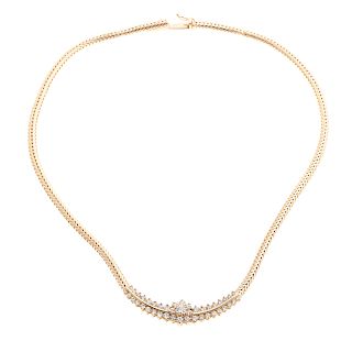 A Ladies Diamond Necklace in 14K Yellow Gold