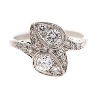A Ladies Vintage Diamond Bypass Ring in Platinum