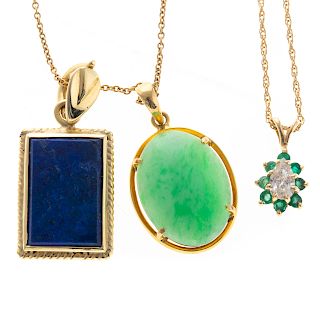 A Pair of Gold Chains and Gemstone Pendants