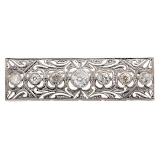 A Ladies Art Deco Diamond Bar Pin in Platinum
