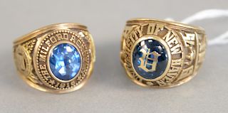 Two 10K gold class rings, 38.8 grams total weight.