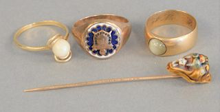 14K gold lot to include three rings and stick pin, 17.5 grams.