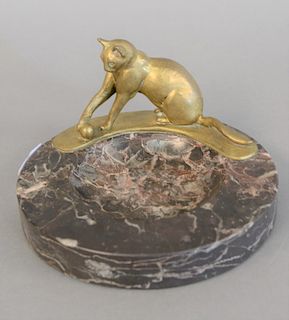 Karl Heynen-Dumont cat bowl having bronze cat playing with a ball on the edge of the granite bowl. dia. 7 in.