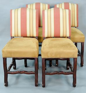 Set of four chairs with suede seats.