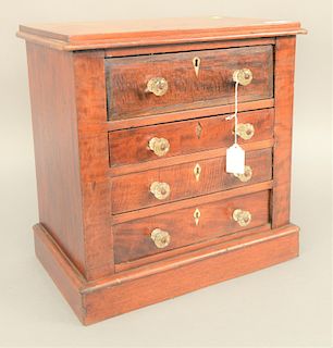 Diminutive four drawer chest. ht. 16 in., wd. 15 1/2 in., dp. 10 in.