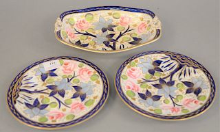 Nineteen piece porcelain dessert set, 19th century, iron red pattern NO. 1813, painted with roses and blue flowers to include two long dishes, two sma
