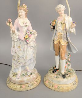 Pair of porcelain figures, man and woman each holding a flower, repaired. figure ht. 16 1/2 in., total ht. 32 in.