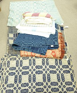 Group of eight quilts and coverlets, two American blue and white coverlets, light blue and white coverlet, blankets and quilts.