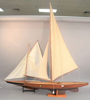 Two pond boat models. ht. 69 1/2 in., lg. 49 in and 35 1/2 in.