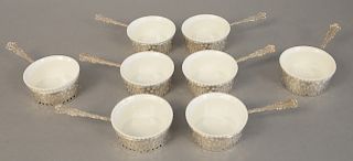 Eight sterling silver ramekins with porcelain liners. 9.8 t oz.