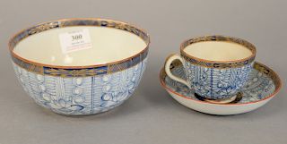 Chinese export cups and saucers, blue and white with gilt decorated border.