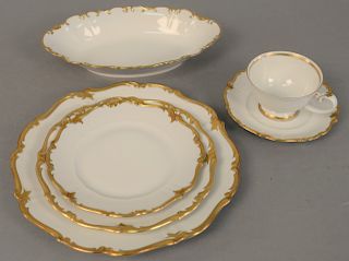German china dinnerware, settings for eleven with 77 total pieces. Provenance: An Estate from 5th Avenue, New York