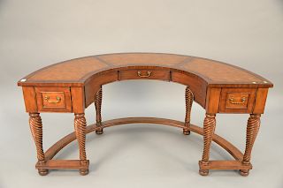 Half round desk with leather top and three drawers. ht. 30 1/2 in., wd. 66 in., dp. 35 in.