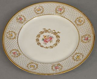 Set of twelve Limoge service plates, sold by Gilman Collamore.