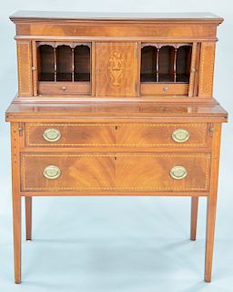 Tambour style desk in two parts with lift top compartment (part of right door missing). ht. 45 in., wd. 36 in.