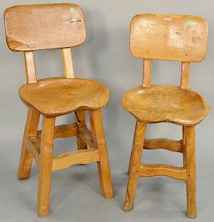 Pair of free form rustic bar stools.
