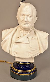Sevres bust Adolphe Thiers, 19th century biscuit on blue and gold glaze porcelain base, figure ht. 11 in., total ht. 28 in. Provenance: An Estate from