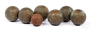 Six bronze cannon balls, etc.