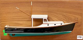 Half hull model of down east fishing boat on teak panel, signed lower left. 