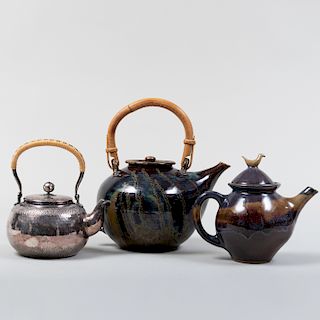 Two Studio Pottery Glazed Earthenware Teapots and a Japanese Silver Metal Teapot