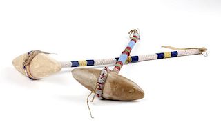Two Plains Indian stone and beaded-handle war clubs