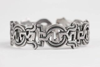 A silver bracelet, Pedro Castillo