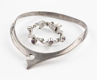A silver collar and amethyst bangle