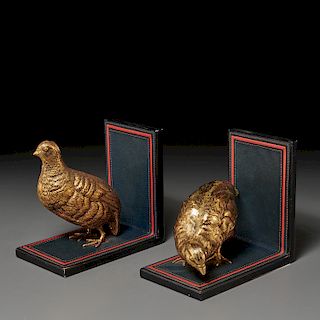 Pair Gucci gilt metal and leather bookends