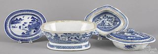 Four pieces of Chinese export blue and white porcelain, 19th c., to include a tureen (lacking cover)