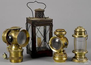 Tin carry lantern, together with two solar lanterns and another brass carry lantern, tallest - 10''.
