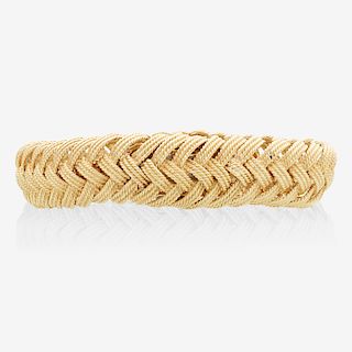 YELLOW GOLD HIDDEN WATCH BRACELET, RETAILED BY TIFFANY & CO.