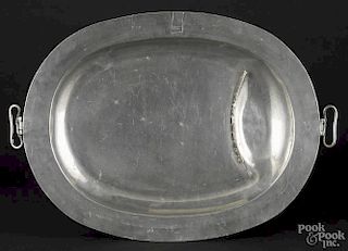 Large English pewter warming tray or hot water platter, 18th/19th c., with ball feet
