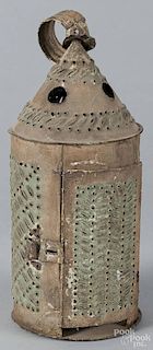 Punched tin lantern, 19th c., with an old gold and green painted surface, 12 1/2'' h.