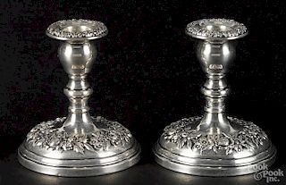 Pair of S. Kirk & Sons weighted sterling silver candlesticks, 4 1/2'' h.