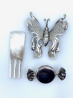 Two Sterling Brooches and a Tiffany Divot Repair